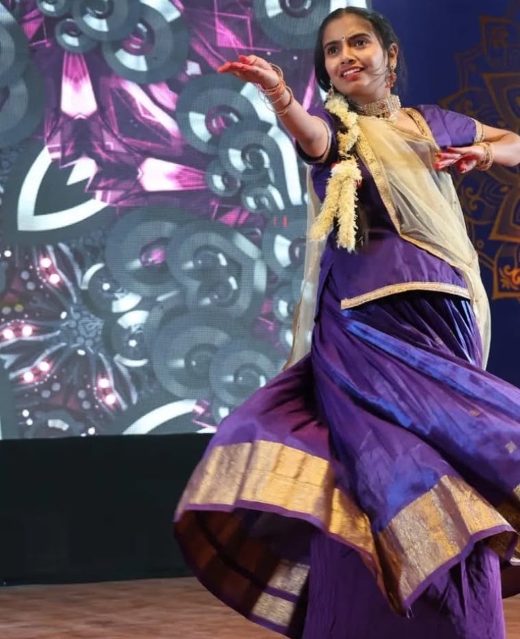Dancer performing solo on stage